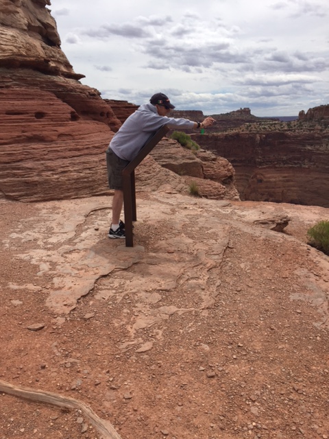 Robert leaning over taking pic